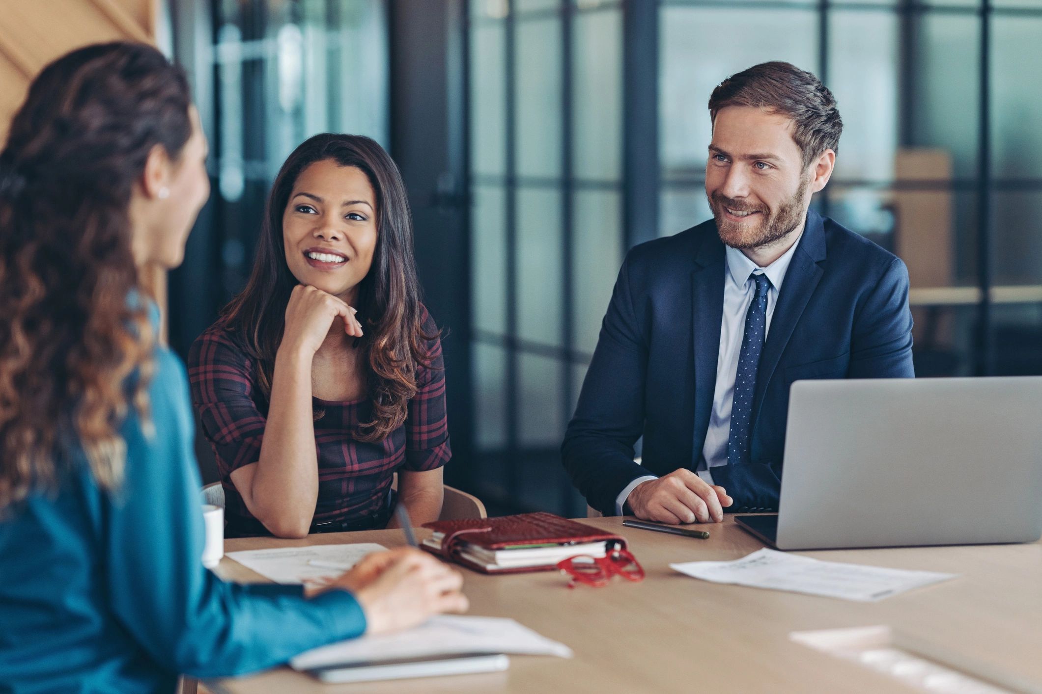Professional business meeting reflecting advisory support